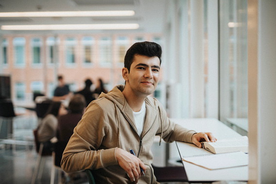 male student looking to camera